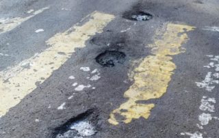 repair of cracks in asphalt